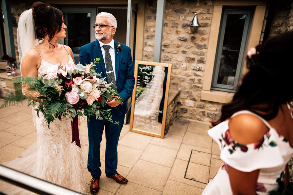 Bouquet Flowers Bride Bridal Red Pink Burgundy Protea Rose Asilbe Peony Fern Ribbons Gamekeepers Inn Wedding Fairclough Studios