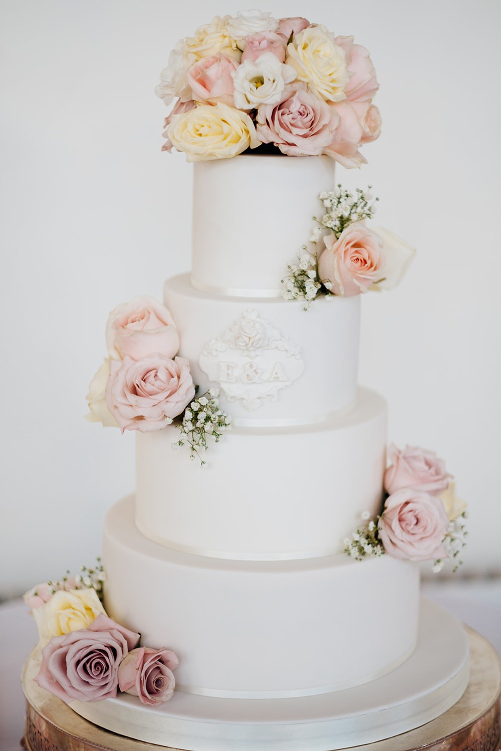 White Cake Tiered Icing Pink Blush White Roses Gypsophila Monogram Kew Gardens Wedding Marianne Chua Photography