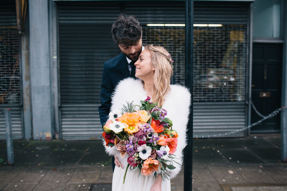 Bride Bridal Bouquet Flowers Bright Colourful Icelandic Poppies Mauve Roses Ranunculus Anemones Wax London Elopement Wedding Asylum Robbins Photographic