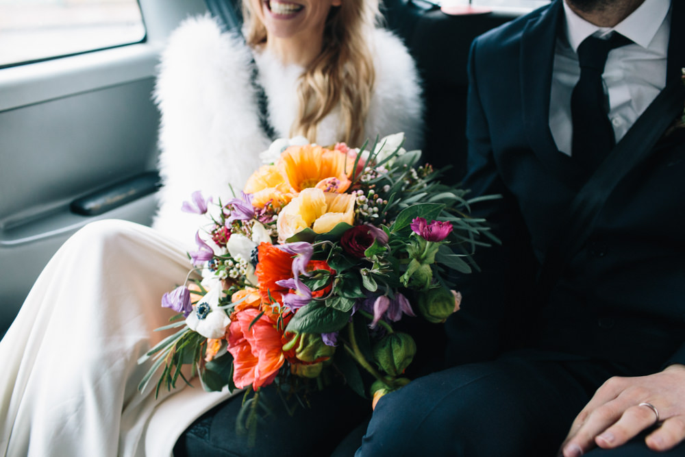 Bride Bridal Bouquet Flowers Bright Colourful Icelandic Poppies Mauve Roses Ranunculus Anemones Wax London Elopement Wedding Asylum Robbins Photographic