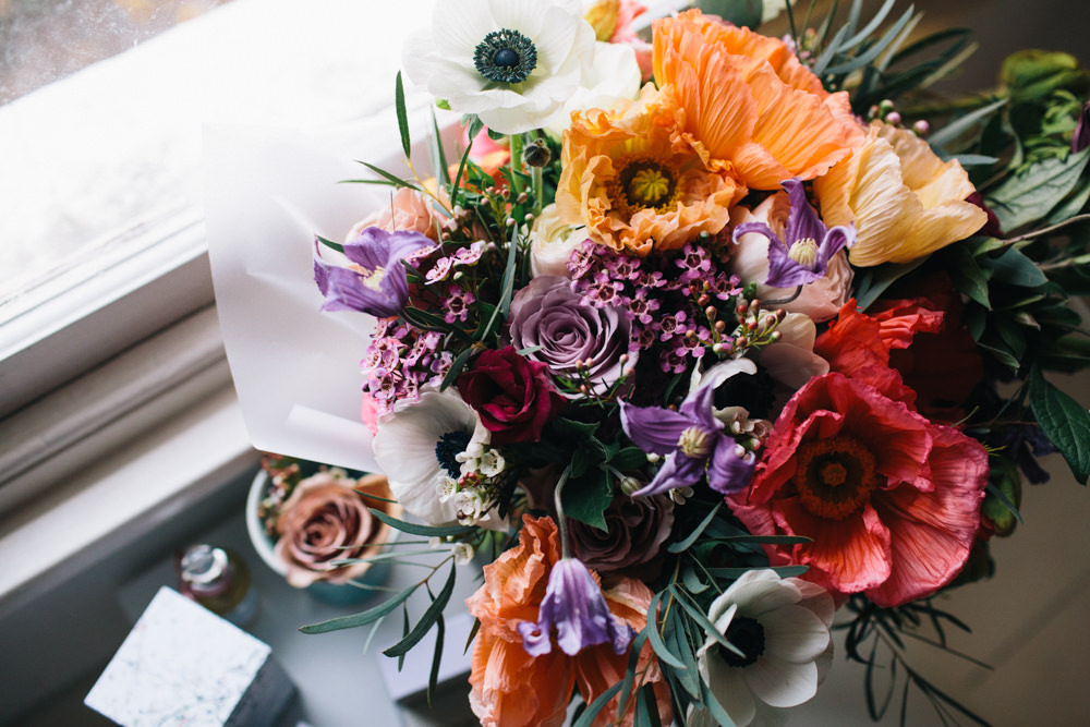 Bride Bridal Bouquet Flowers Bright Colourful Icelandic Poppies Mauve Roses Ranunculus Anemones Wax London Elopement Wedding Asylum Robbins Photographic