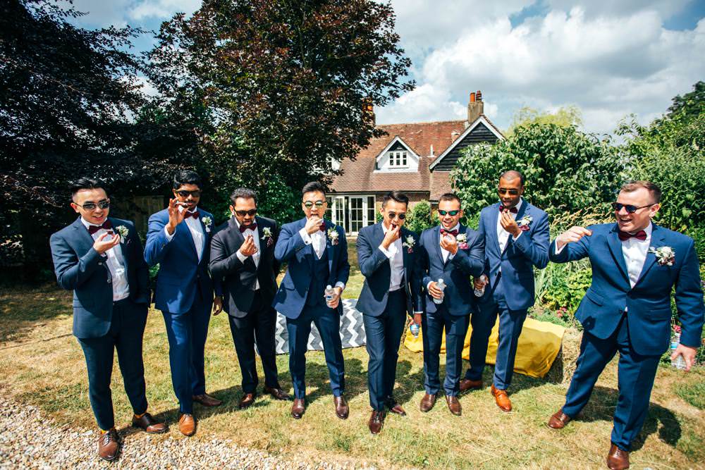 Groom Groomsmen Blue Suits Burgundy Bow Ties Long Barn Wedding Three Flowers Photography