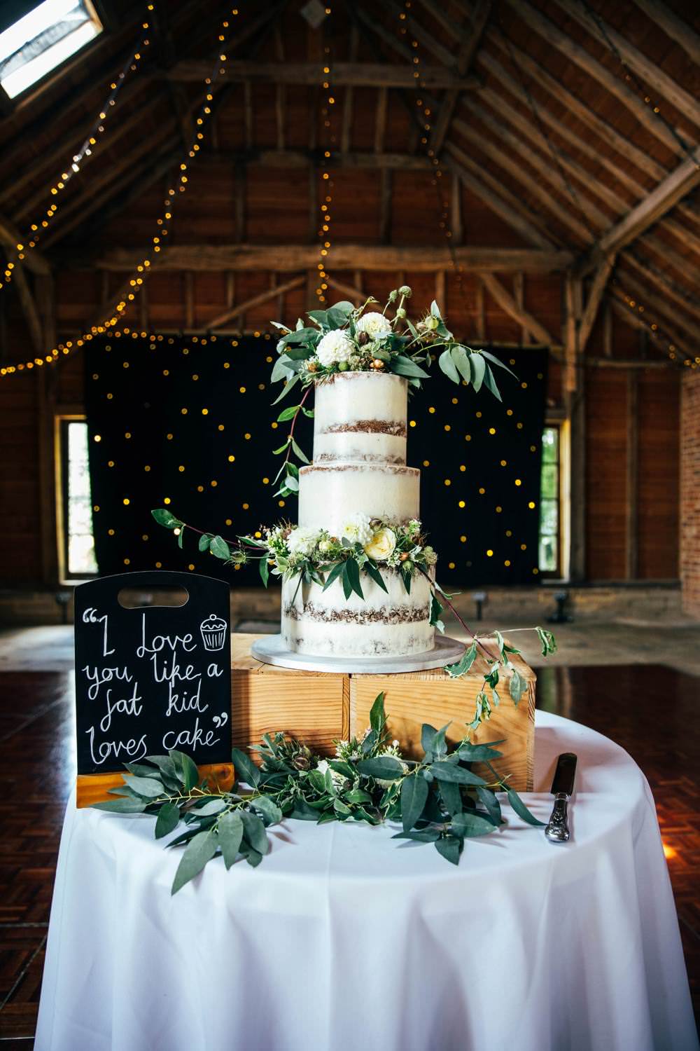 Semi Naked Cake Table Greenery Foliage Flowers Wooden Box Crate Long Barn Wedding Three Flowers Photography