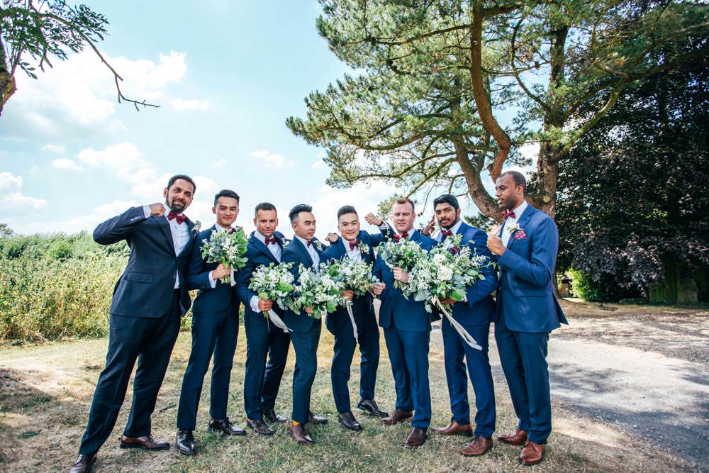 Groom Groomsmen Blue Suits Burgundy Bow Ties Bouquets Long Barn Wedding Three Flowers Photography