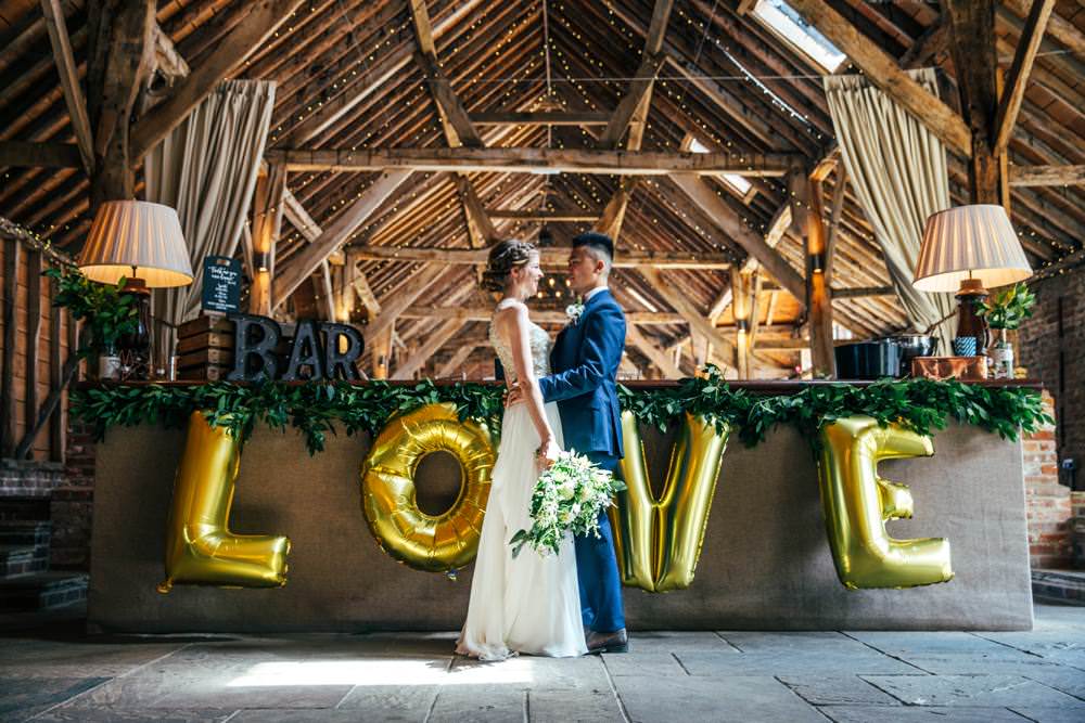 LOVE Balloons Gold Long Barn Wedding Three Flowers Photography