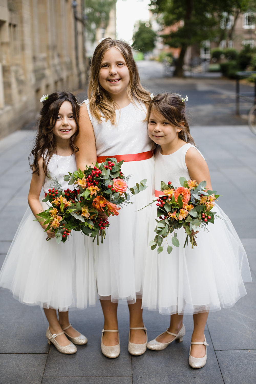 Flower Girls Orange Red Sash Bouquet Peach Rose Berry Manchester Museum Wedding Chris Barber Photography