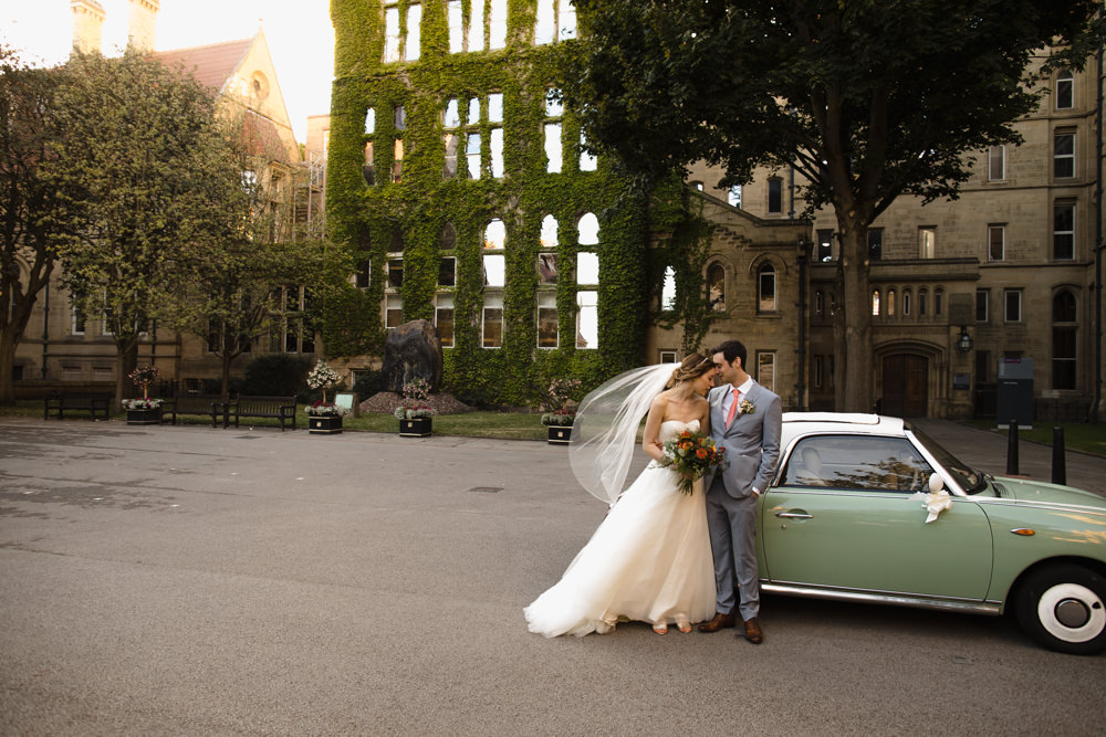 Bride Bridal Watters Sweetheart Neckline A Line Strapless Embellished Veil Blue Grey Ted Baker Suit Groom Nissan Figaro Vintage Car Transport Manchester Museum Wedding Chris Barber Photography