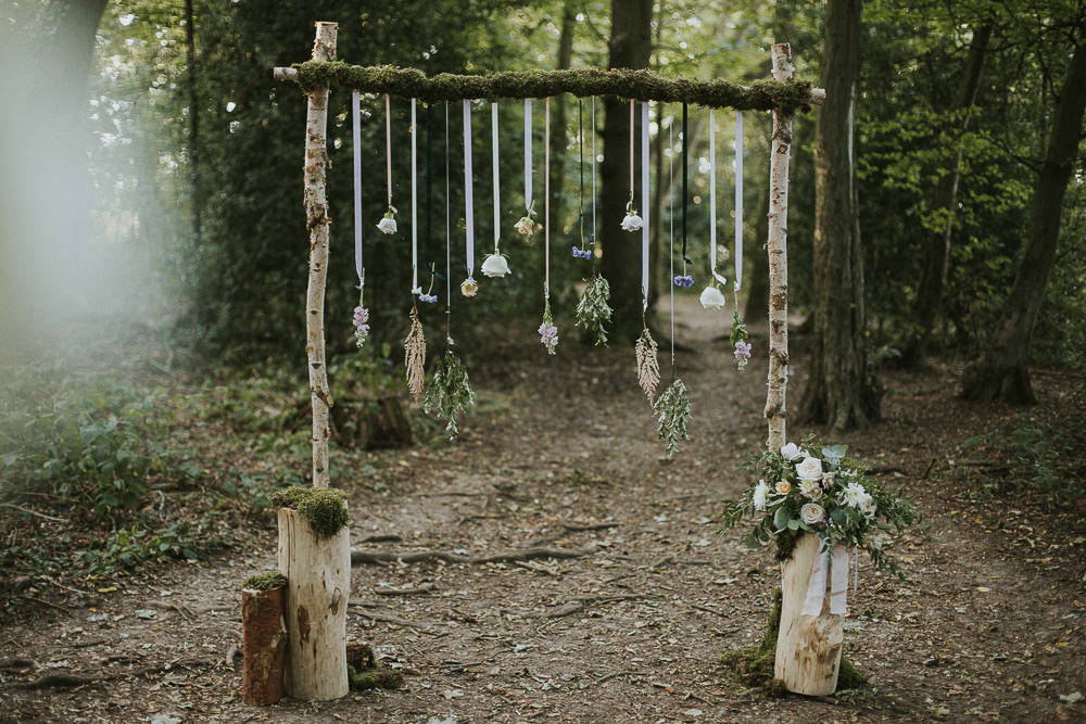 Wooden Arch Branch Backdrop Hanging Flowers Ribbons Modern Bohemian Woodland Wedding Ideas Lily Lane Photography