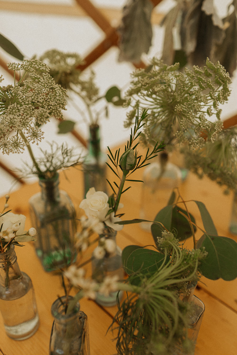 Bottles Flowers Greenery Foliage Eucalyptus Riverside Weddings Oxfordshire Yurt Luis Calow Photographer
