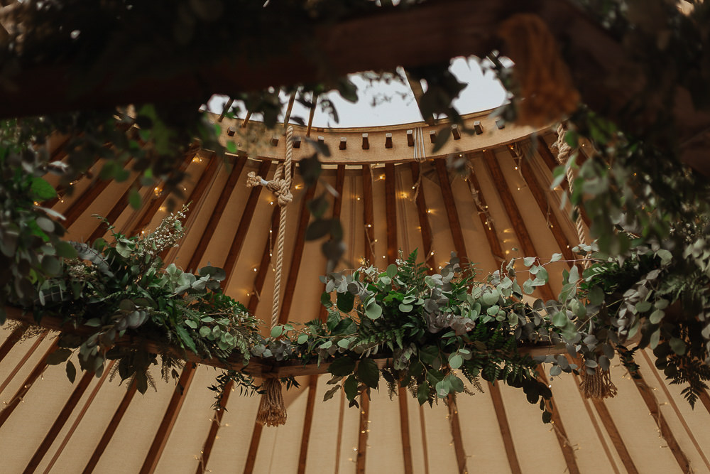 Hanging Hoop Suspended Flowers Greenery Foliage Eucalyptus Riverside Weddings Oxfordshire Yurt Luis Calow Photographer