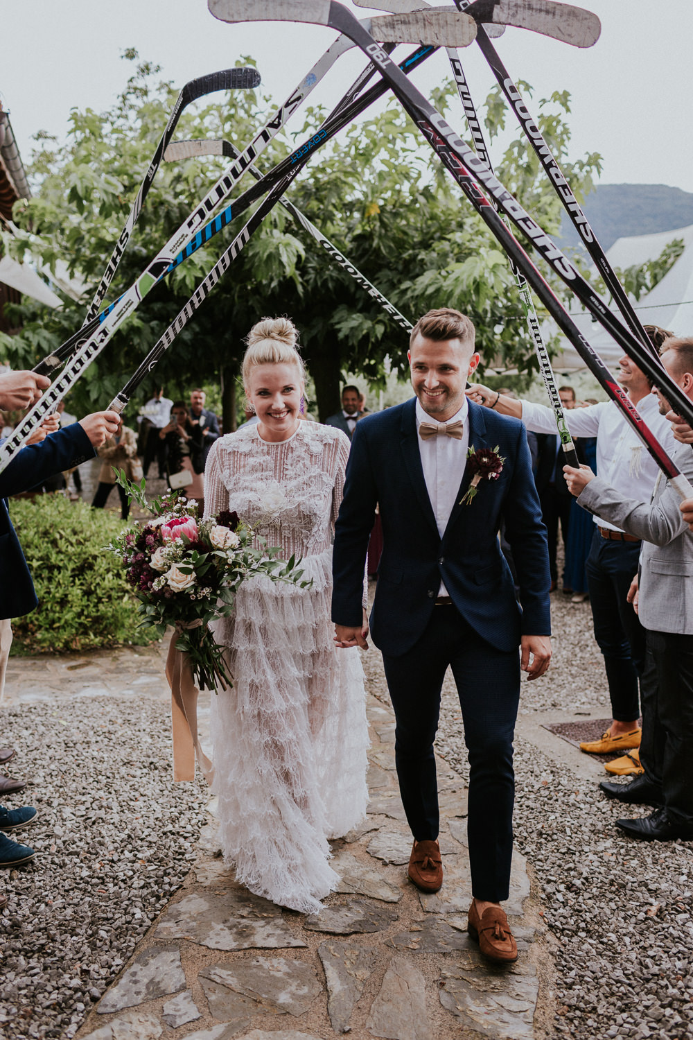Hockey Stick Arch Bride Groom Slovenia Wedding Bohemian Maja Tsolo Photography