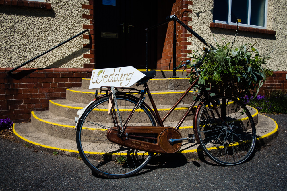 Bike Bicycle Flowers Sign Basket Stepney Hill Farm Wedding Emma + Rich Photography