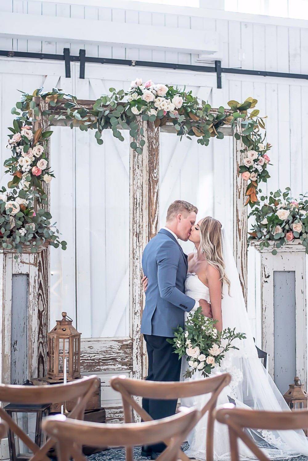 Bride Bridal Dress Gown Fit & Flare Fishtail Strapless Embroidered Veil Mismatched Blue Groom Archway Floral Pedestal White Sparrow Barn Wedding White Blue Ideas Si Creative Photography