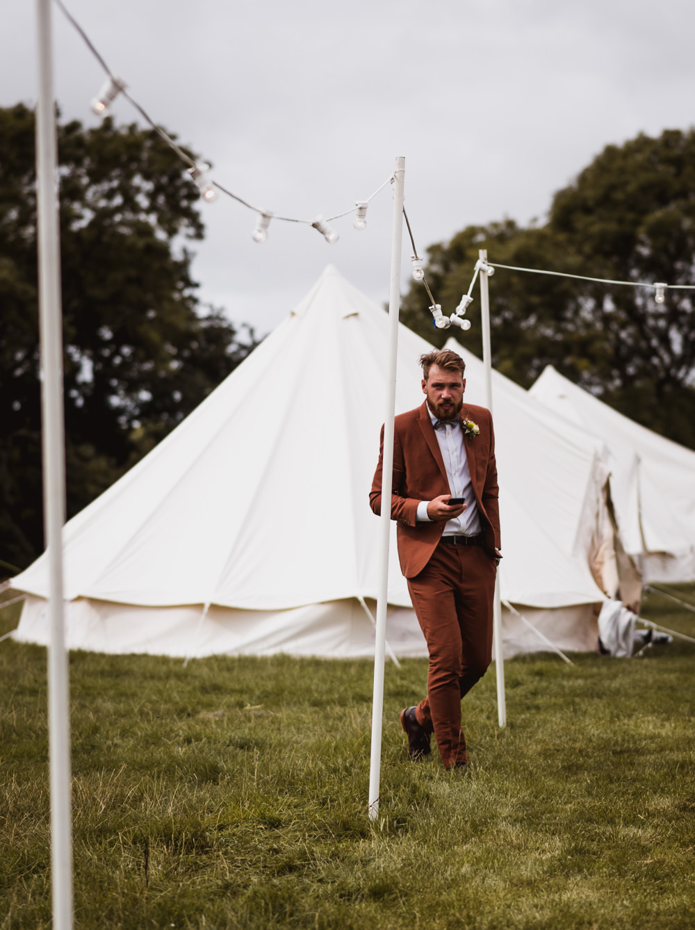 Tan Suit Bow Tie Groom Festoon Lighting Wilkswood Farm Wedding Robin Goodlad Photography