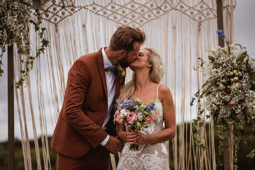 Bride Bridal Grace Loves Lace Rosa Sleeveless Dress Gown Boho Macrame Floral Flowers Gypsophila Ceremony Backdrop Tan Suit Bow Tie Groom Wilkswood Farm Wedding Robin Goodlad Photography