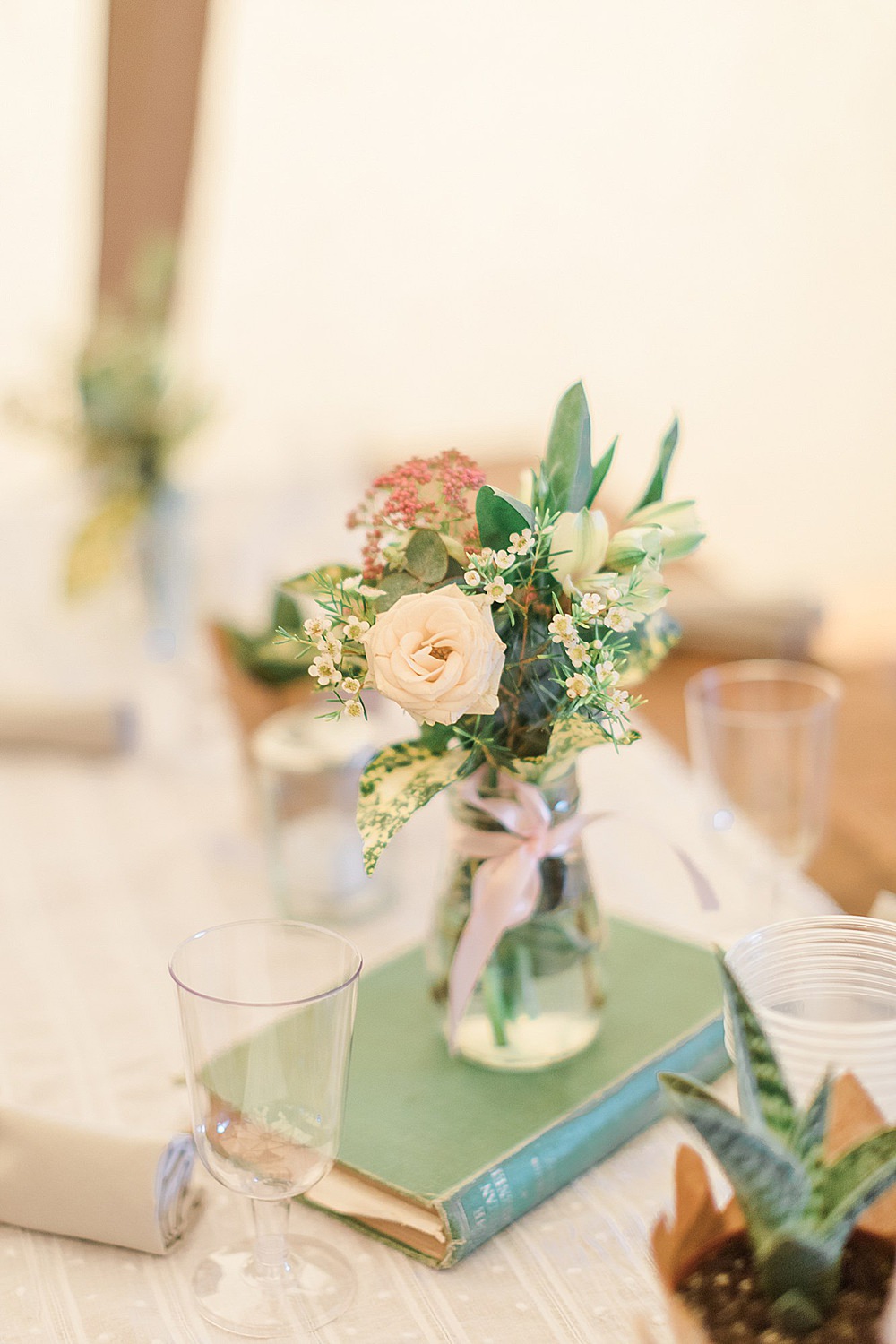 Bottle Jar Flowers Wax Rose Centrepiece Book Table Chiltern Open Air Museum Wedding Terri & Lori Fine Art Photography