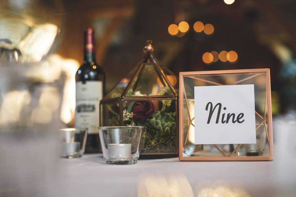 Terrarium Flowers Red White Greenery Foliage Table Name Number Copper Frame Christmas Wedding Gareth Newstead Photography
