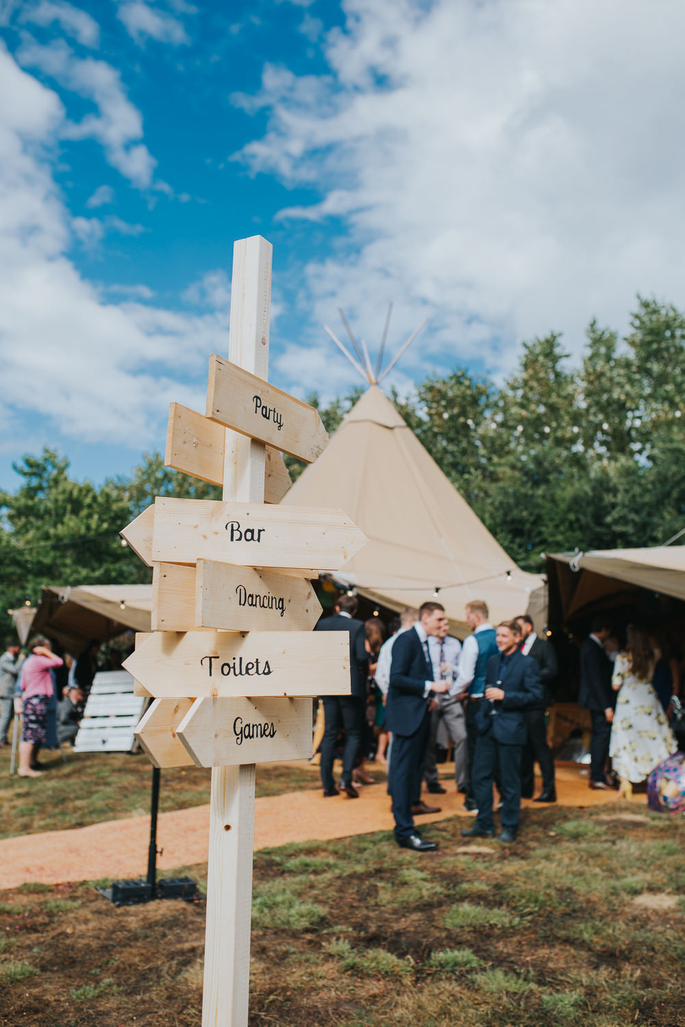 Wooden Sign Post Directions Colourful Tipi Wedding Charlotte Razzell Photography