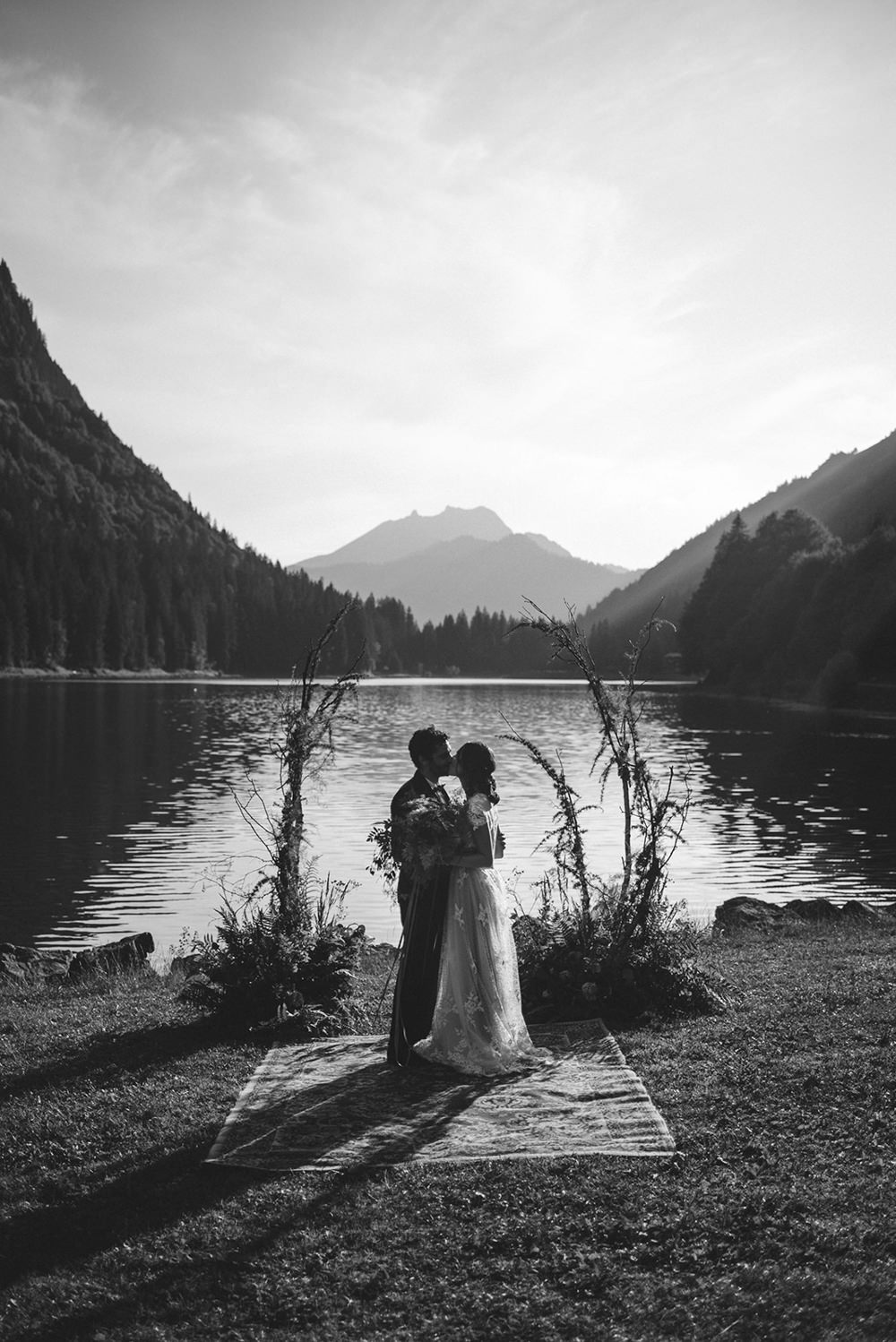 Backdrop Flowers Ceremony Persian Rug Aisle Branches Lake Outdoor French Alps Folk Boho Mountain Wedding Ideas Katja & Simon Photography