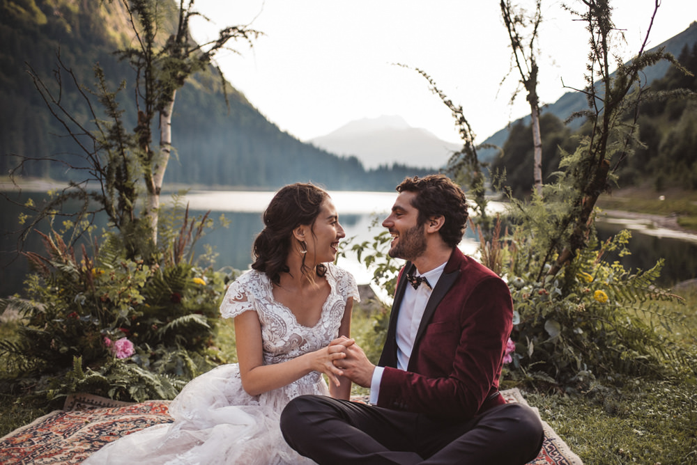 Backdrop Flowers Ceremony Persian Rug Aisle Branches Lake Outdoor French Alps Folk Boho Mountain Wedding Ideas Katja & Simon Photography