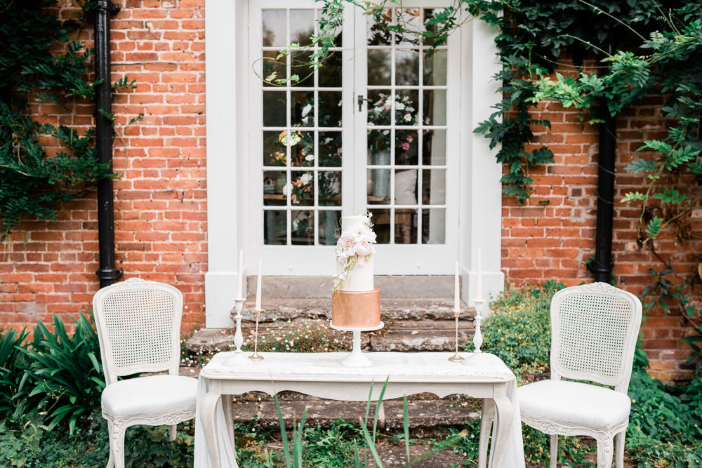 Metallic Cake Gold Copper Flowers Floral Pale Pink Table Candles Golden Autumnal Wedding Ideas Joanna Briggs Photography