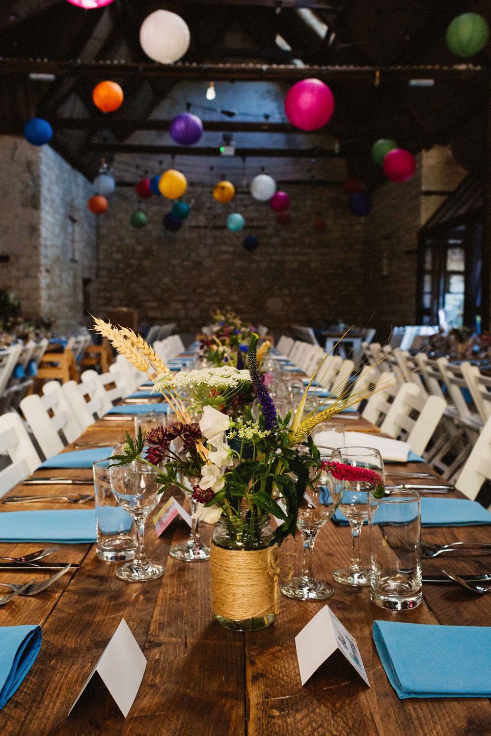 Barn Colourful Lanterns Long Tables Decor Gorwell Farm Wedding Jason Williams Photography