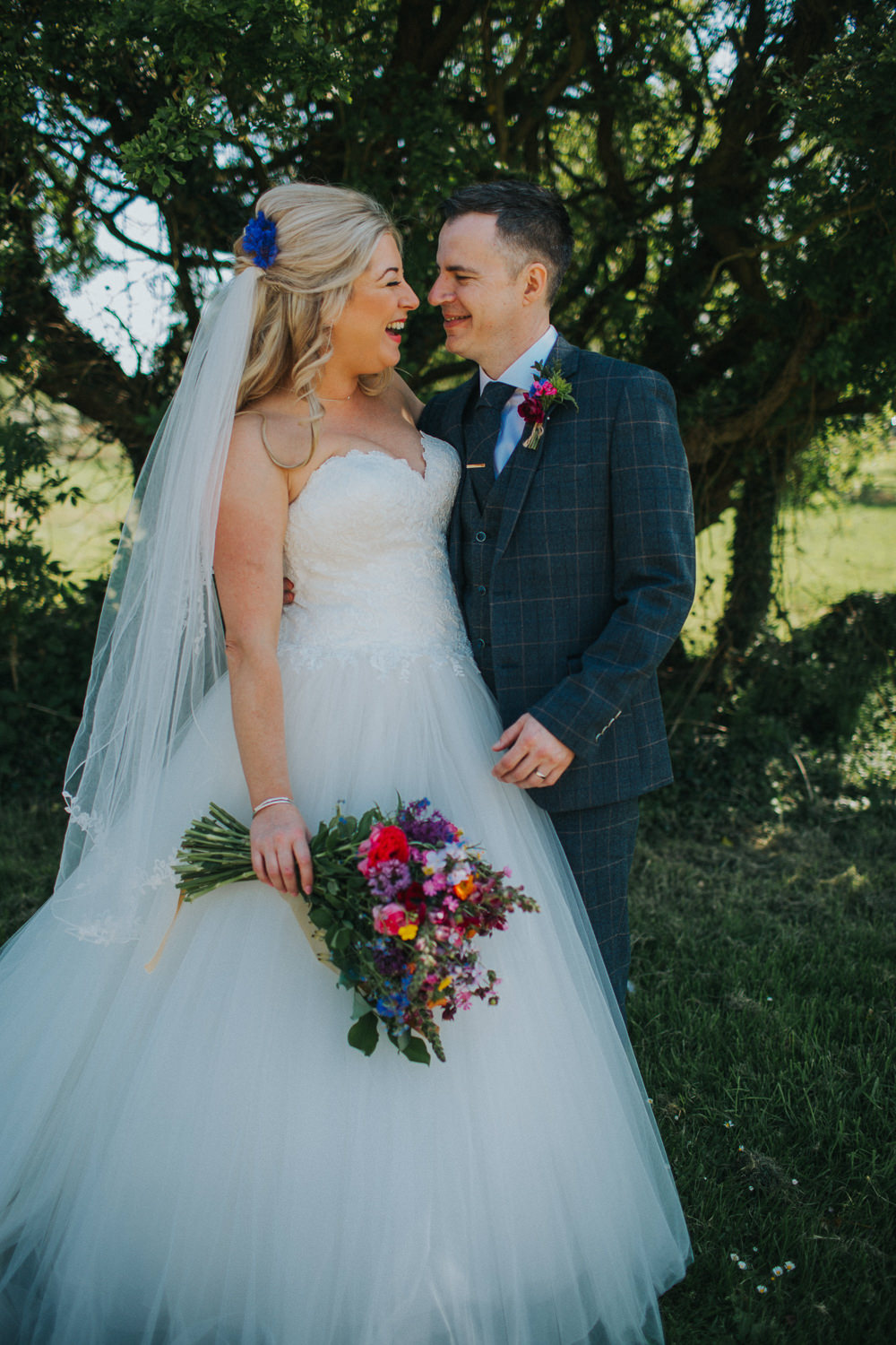 Bride Bridal Dress Gown Sweetheart Neckline Lace Princess A Line Tweed Three Piece Suit Groom Veil Wildflower Meadow Bouquet Minnehaha Events Wedding Lisa Webb Photography