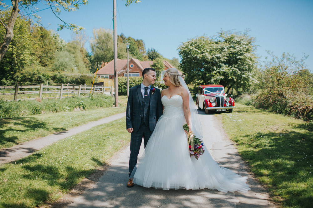 Bride Bridal Dress Gown Sweetheart Neckline Lace Princess A Line Tweed Three Piece Suit Groom Veil Wildflower Meadow Bouquet Minnehaha Events Wedding Lisa Webb Photography
