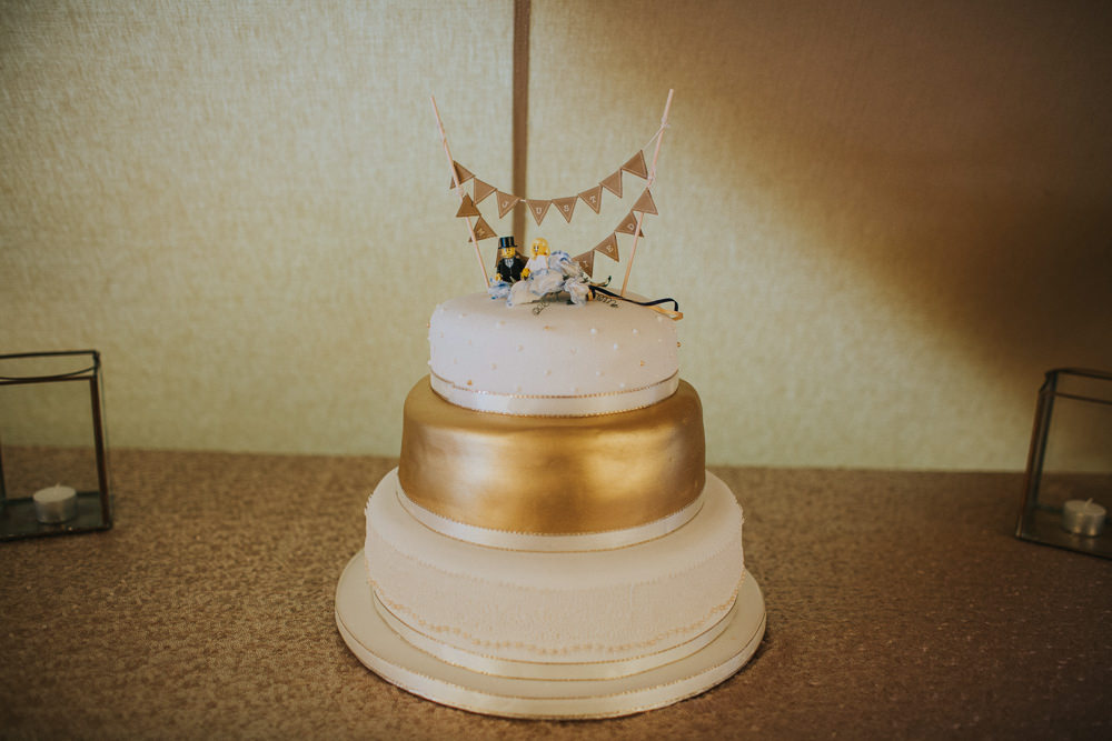 White Gold Cake Bunting Topper Minnehaha Events Wedding Lisa Webb Photography