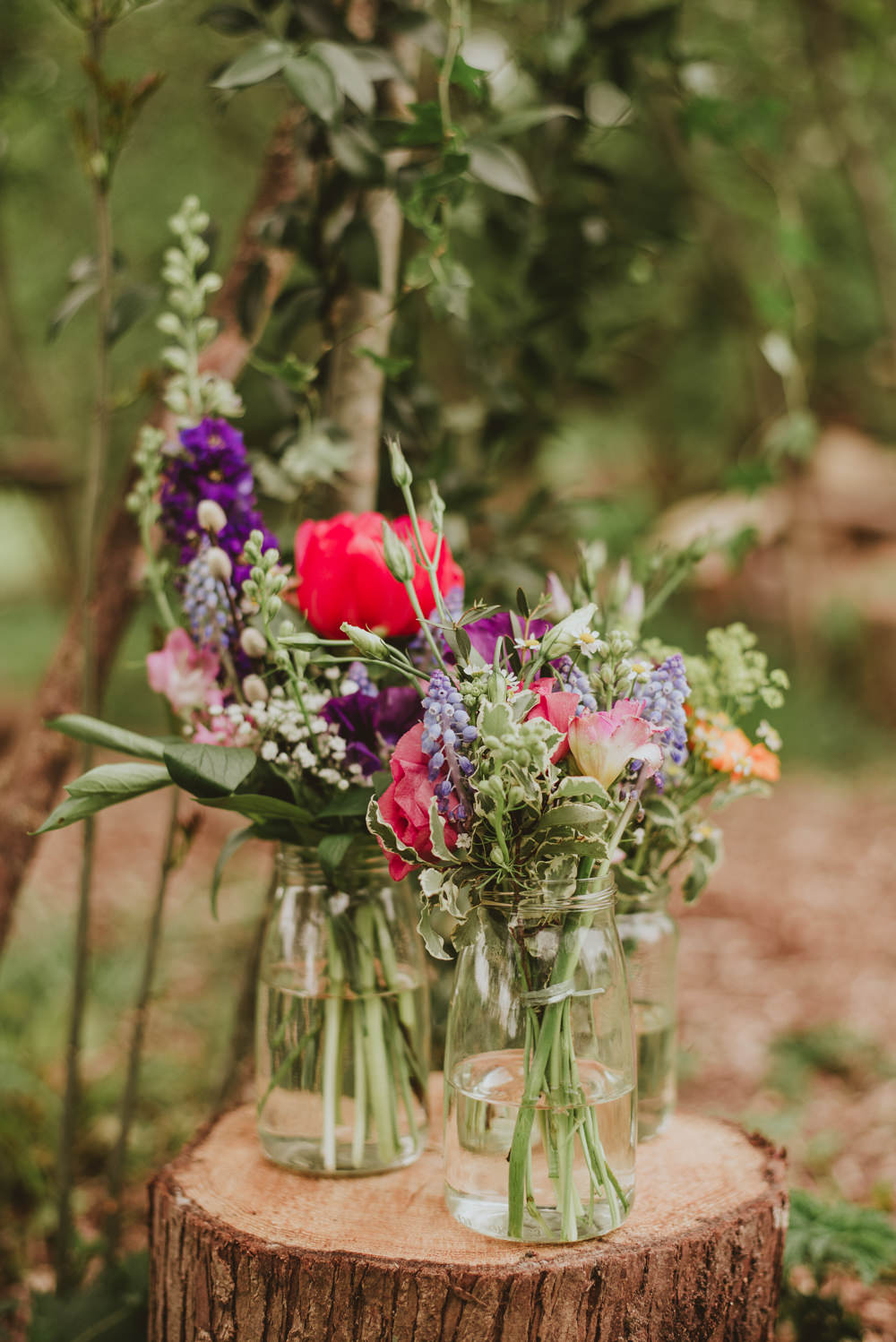 Colourful Jar Flowers Log Stump Tree Peony Stocks Plush Tents Glamping Wedding Big Bouquet Photography