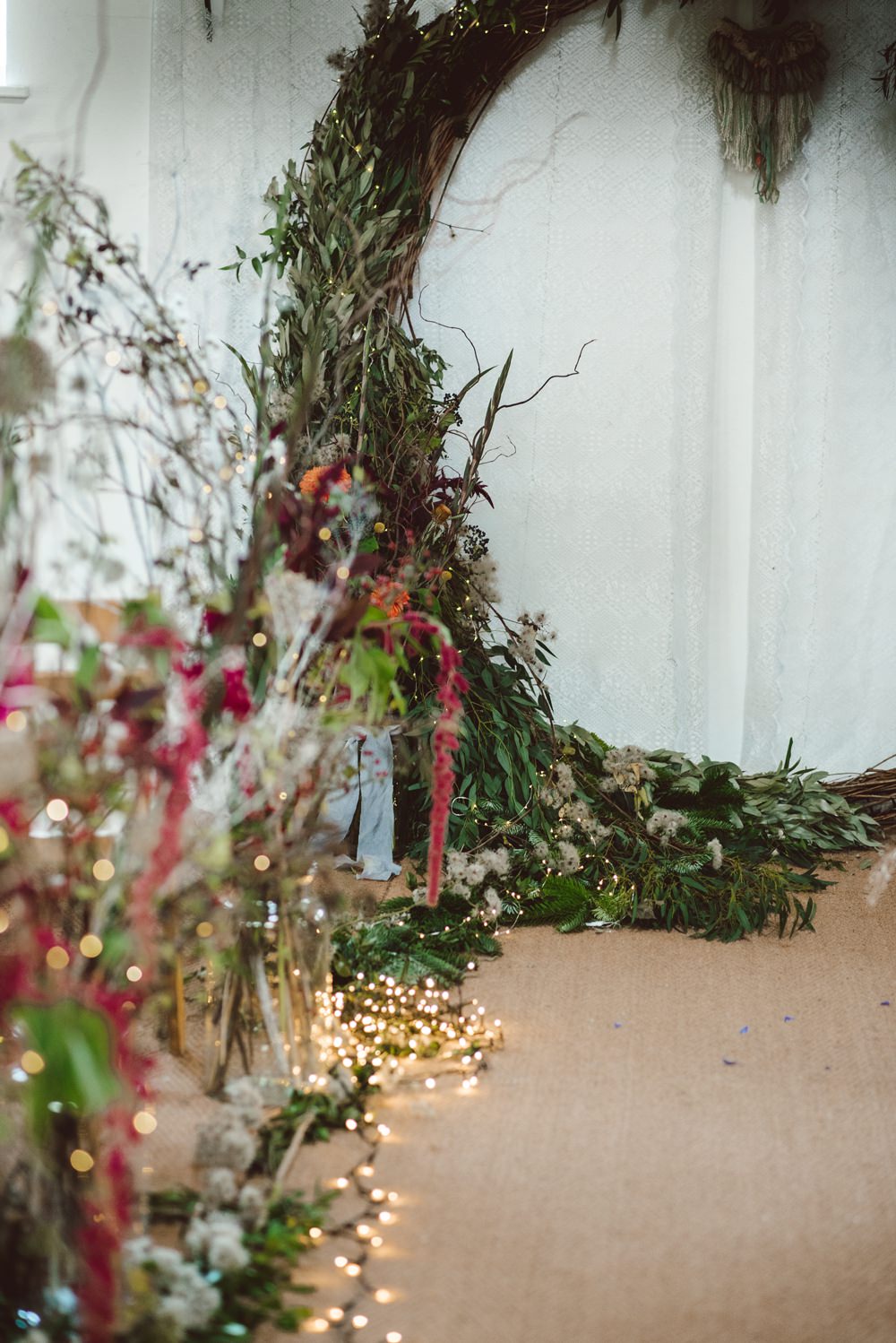 Moongate Flower Arch Backdrop Ceremony Conifer Eucalyptus Greenery Foliage Aisle Fairy Lights Rustic Christmas Wedding Ideas Dhw Photography