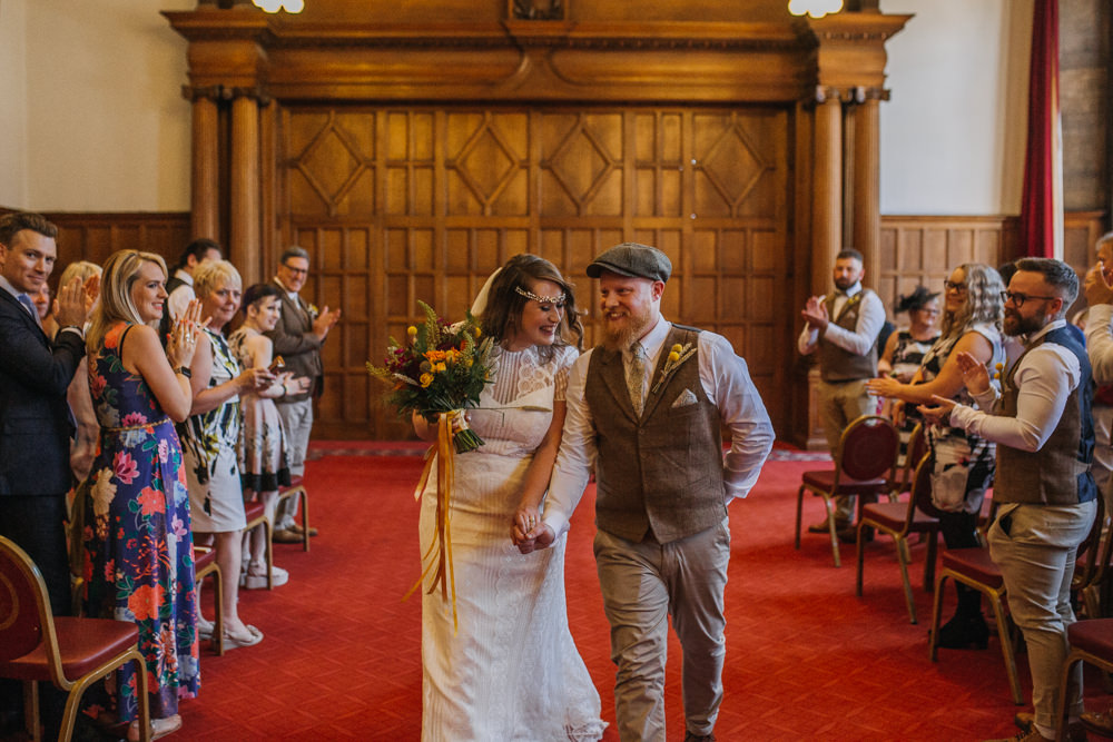 Bride Bridal High Neck Short Sleeve Lace Dress Crystal Headband Headpiece Sweetheart Neckline Waistcoat Tweed Chinos Flat Cap Multicoloured Bouquet Ribbon The Chimney House Wedding Ellie Grace Photography
