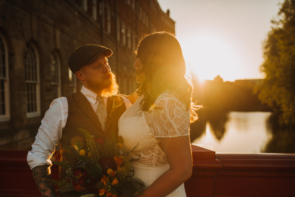 Bride Bridal High Neck Short Sleeve Lace Dress Crystal Headband Headpiece Sweetheart Neckline Waistcoat Tweed Chinos Flat Cap Multicoloured Bouquet Ribbon The Chimney House Wedding Ellie Grace Photography