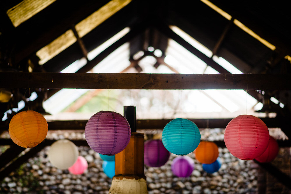 Barn Hanging Paper Lanterns Multicolour West Lexham Wedding James Powell Photography