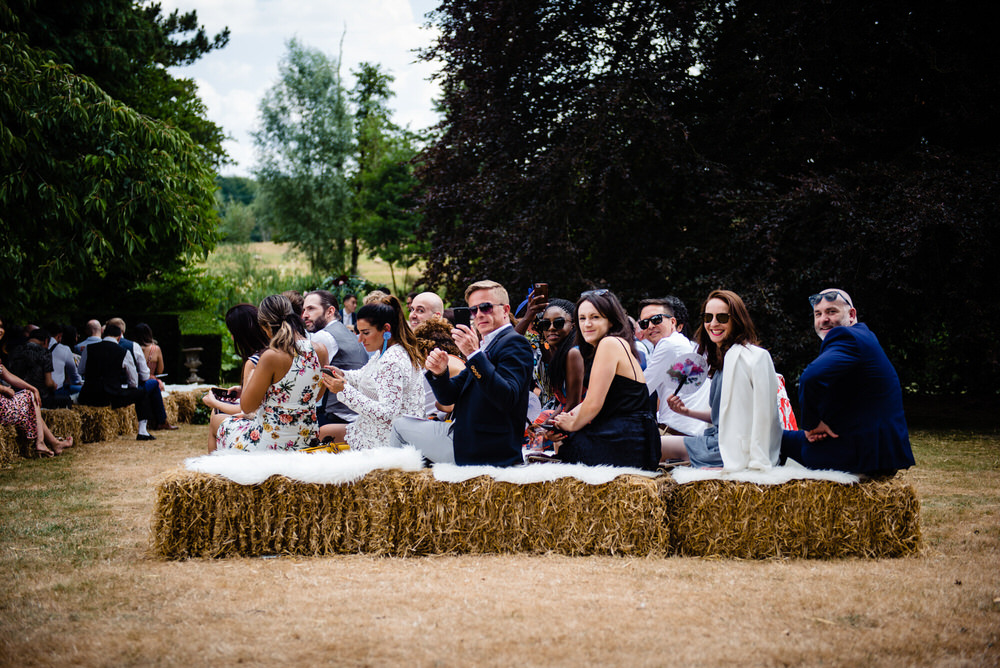 Hay Bales Seating Outdoor Ceremony West Lexham Wedding James Powell Photography