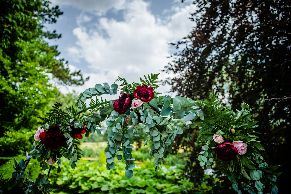Outdoor Ceremony Flower Aisle Arch Backdrop West Lexham Wedding James Powell Photography