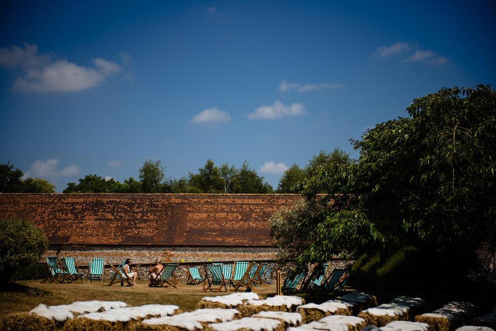 Hay Bales Seating Outdoor Ceremony West Lexham Wedding James Powell Photography