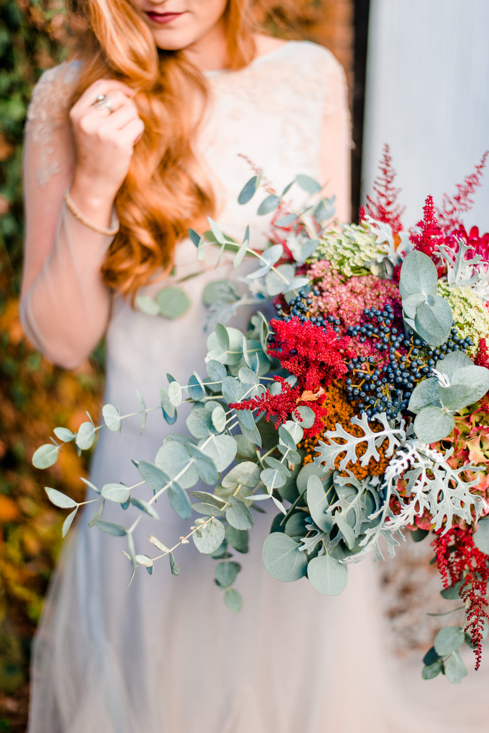 Bouquet Flowers Bride Bridal Red ORange Greenery Foliage Autumn Berries Hydrangea Eucalyptus Astilbe Autumnal Fairytale Wedding Ideas Miriam Peuser Photography
