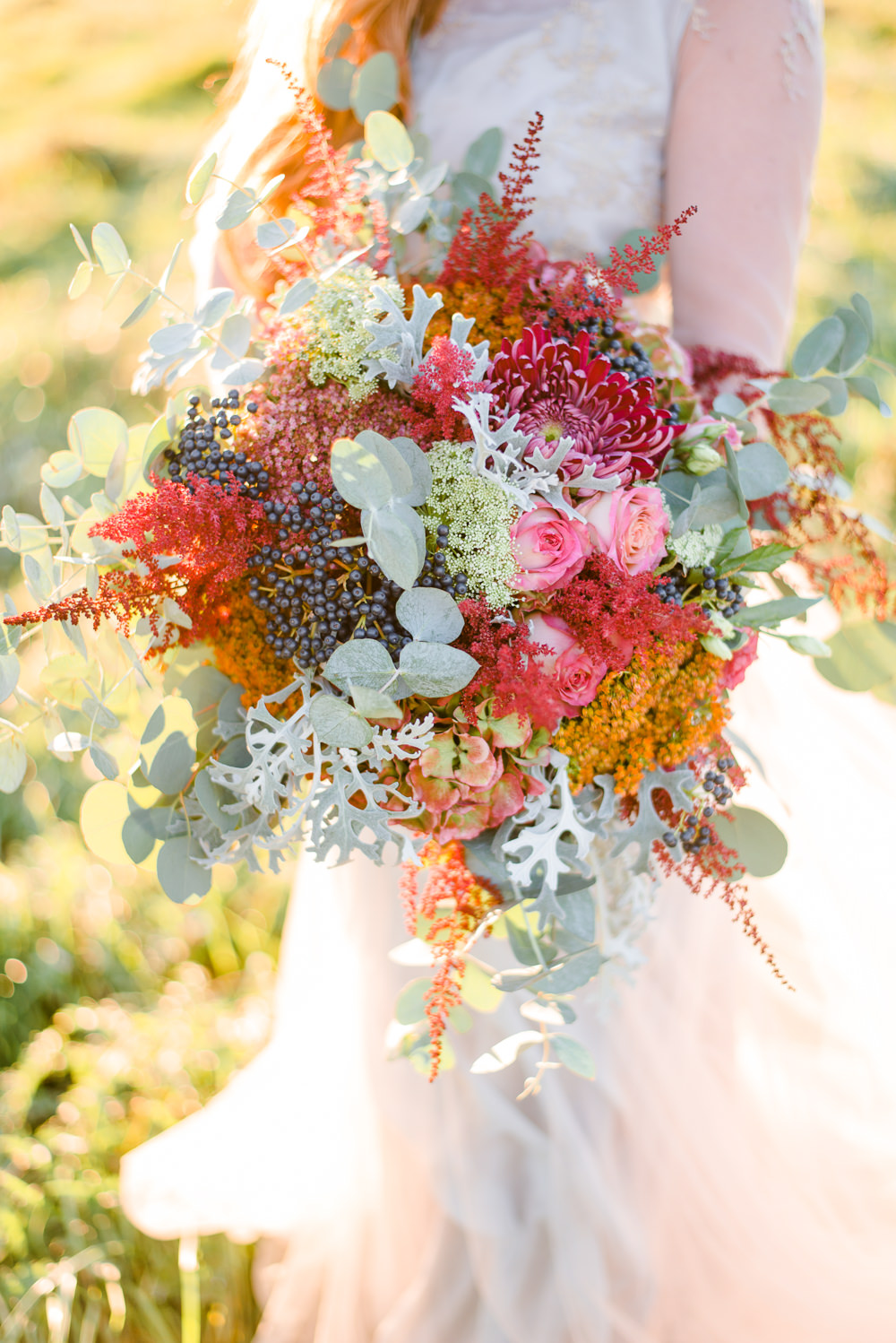 Bouquet Flowers Bride Bridal Red ORange Greenery Foliage Autumn Berries Hydrangea Eucalyptus Astilbe Autumnal Fairytale Wedding Ideas Miriam Peuser Photography