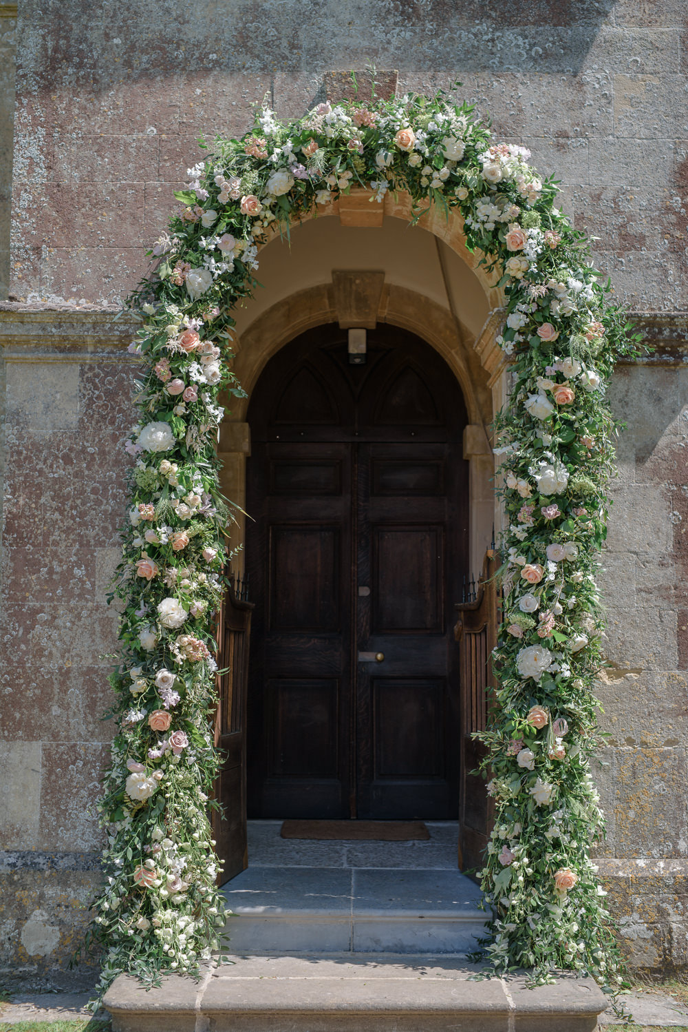 Flowers Floral Archway Entrance Babington House Wedding Ria Mishaal Photography