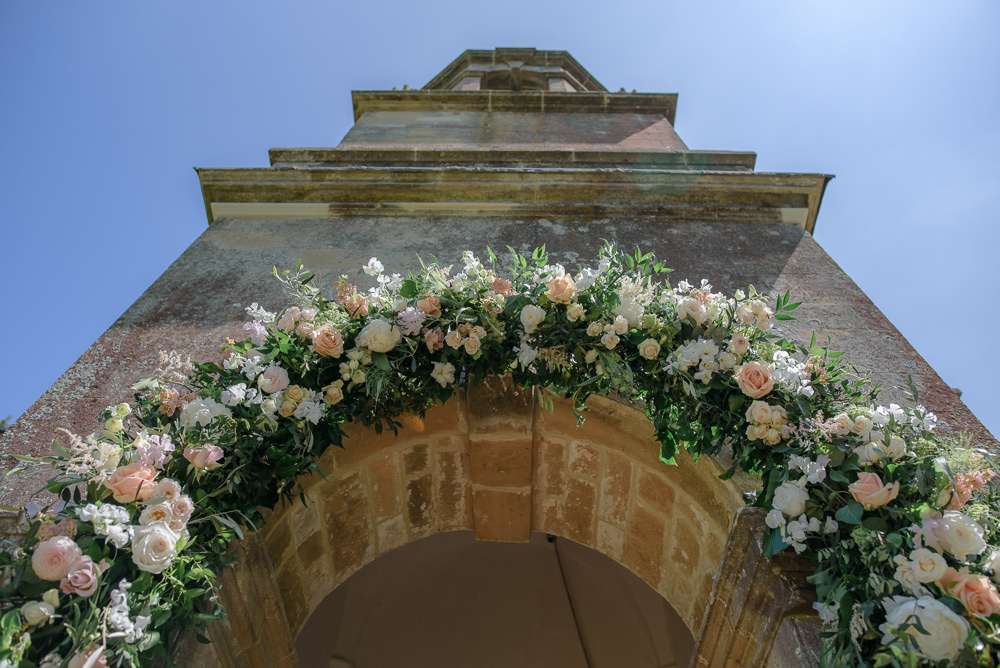 Flowers Floral Greenery Archway Entrance Babington House Wedding Ria Mishaal Photography