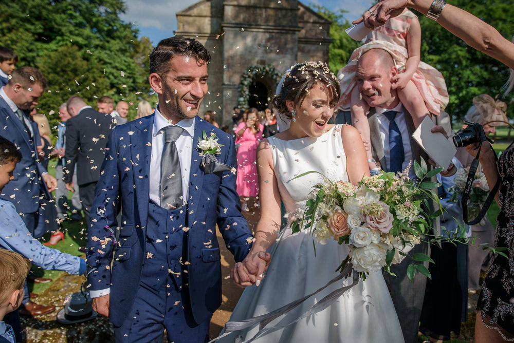 Bride Bridal A Line Dress Straps Sleeveless Silk Boat Neck Neck Blue Suit Groom Veil Confetti Babington House Wedding Ria Mishaal Photography
