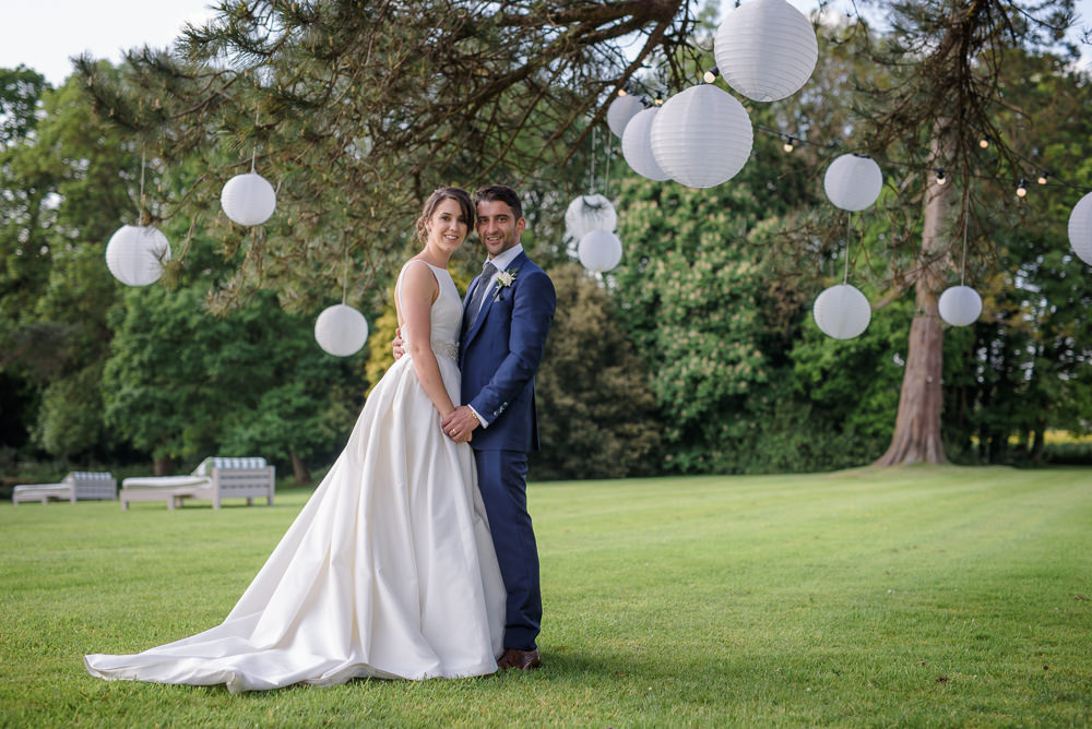 Bride Bridal A Line Dress Straps Sleeveless Silk Boat Neck Blue Suit Groom White Paper Lanterns Babington House Wedding Ria Mishaal Photography