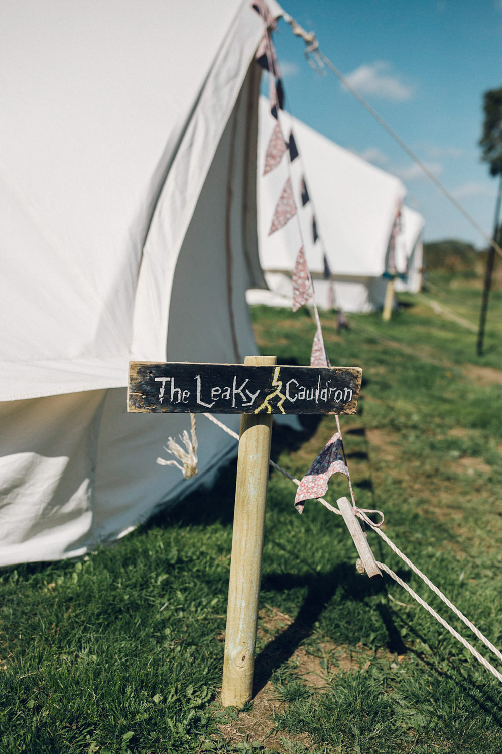 Glamping Bell Tents Sign Post Bright Camp Festival Wedding Chloe Lee Photography