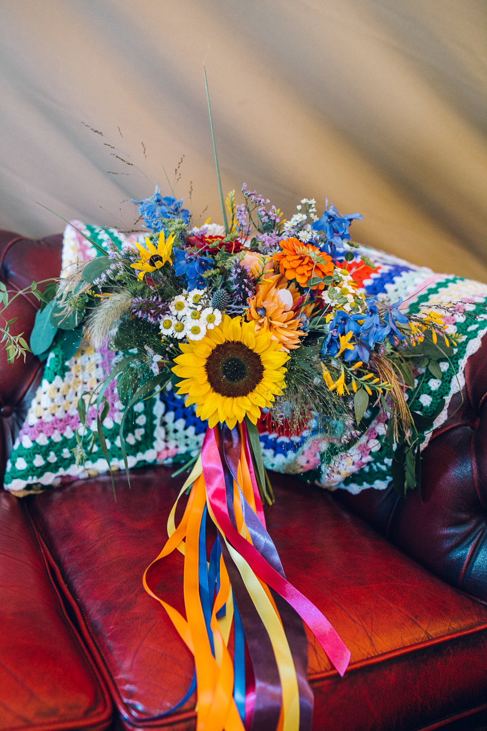 Bouquet Flowers Bride Bridal Ribbon Colourful Sunflower Daisy Wild Meadow Bright Camp Festival Wedding Chloe Lee Photography