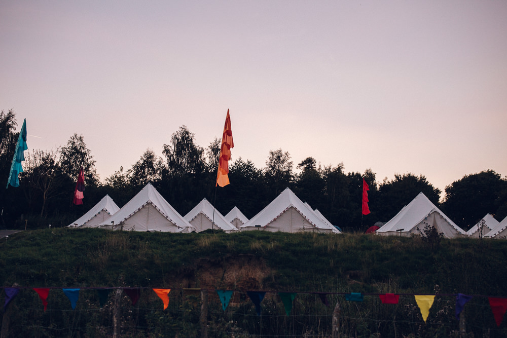 Glaping Bell Tents Flags Festival Bright Camp Festival Wedding Chloe Lee Photography