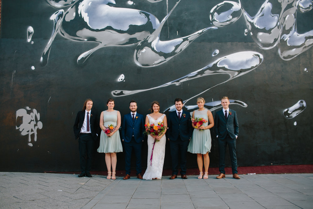 Bride Bridal Watters Lace Sleeveless Dress Gown Navy Suit Groom Colourful Multicoloured Bouquet Ribbon Mint Short Bridesmaids Constellations Liverpool Wedding Dan Hough Photo