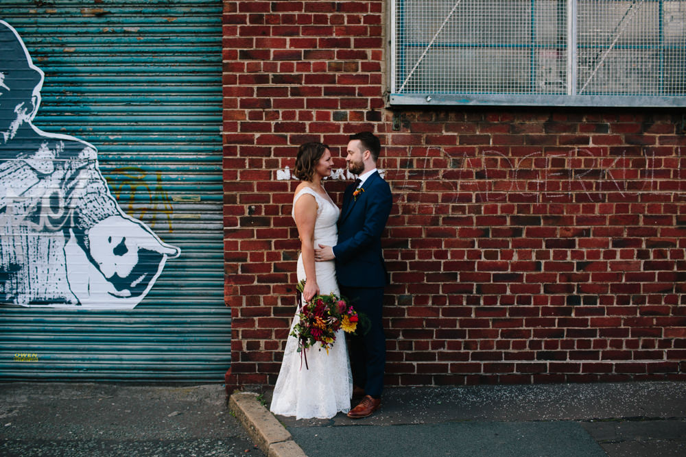 Bride Bridal Watters Lace Sleeveless Dress Gown Navy Suit Groom Colourful Multicoloured Bouquet Ribbon Constellations Liverpool Wedding Dan Hough Photo