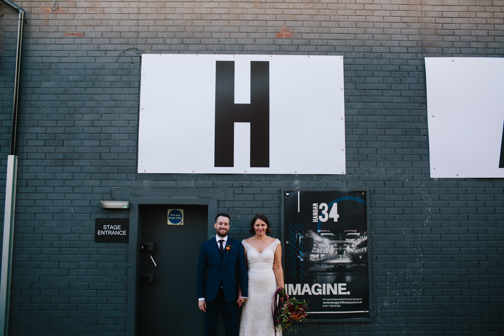 Bride Bridal Watters Lace Sleeveless Dress Gown Navy Suit Groom Colourful Multicoloured Bouquet Ribbon Constellations Liverpool Wedding Dan Hough Photo