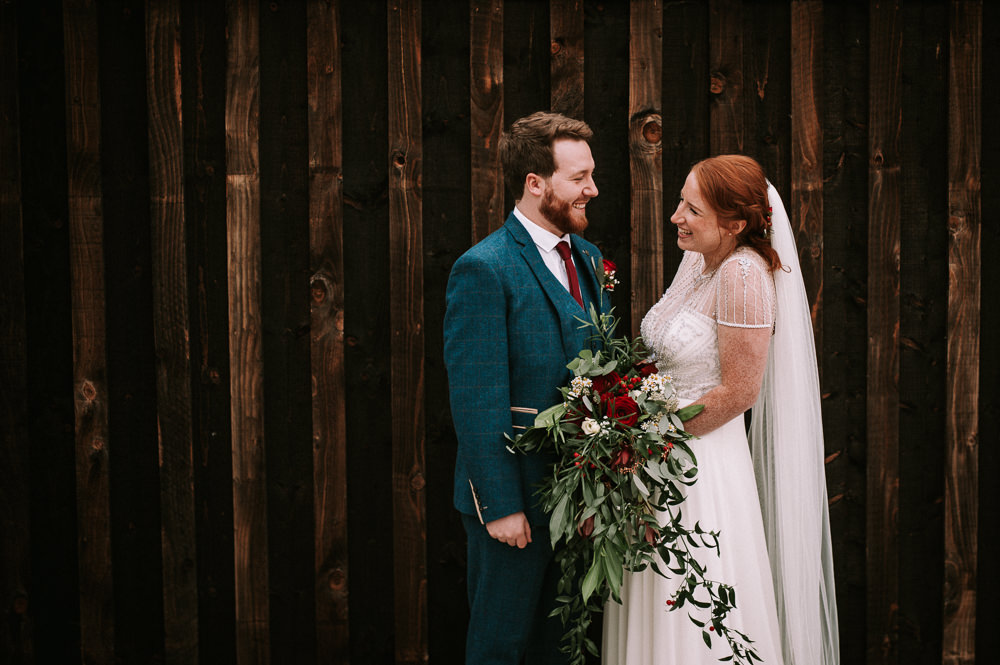 Bride Bridal Jenny Packham Beaded Dress Gown Three Piece Suit Groom Burgundy Tie Foliage Cascading Bouquet Berries Hazel Gap Wedding Maree Frances Photography